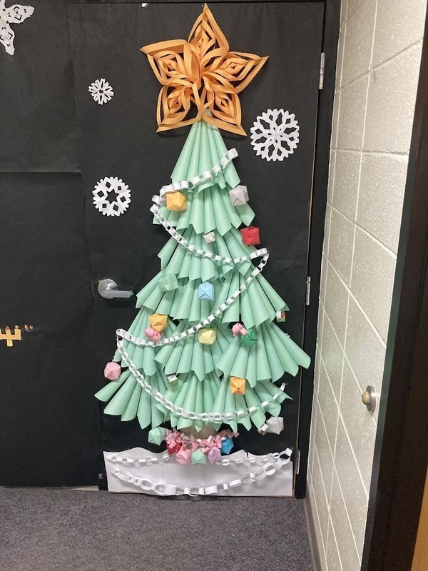 door decorated with a Christmas tree