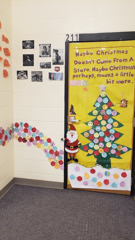 door decorated with Christmas tree and Santa